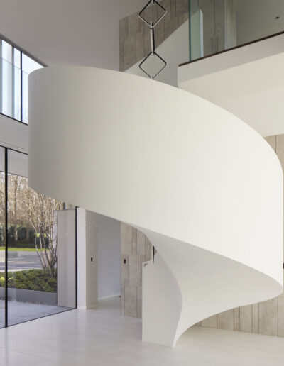 modern minimal white helical staircase